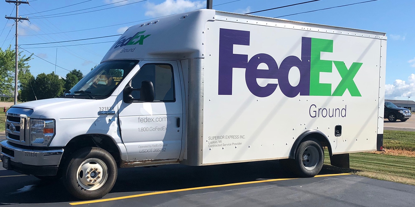 FedEx Ground vehicle at parking area